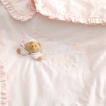 Puccio pink jersey blanket for pram
